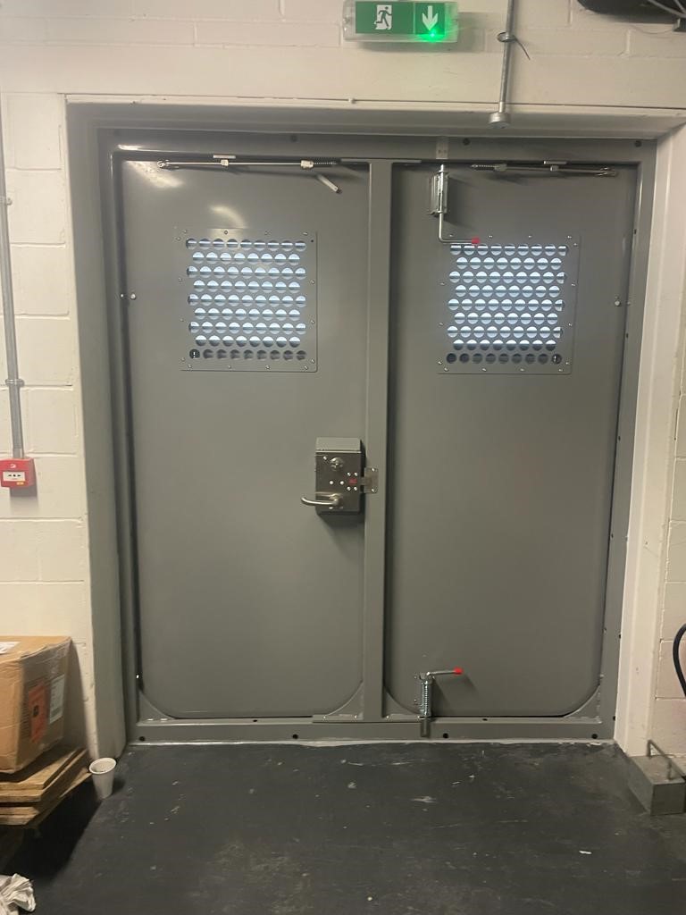 double swing steel flood door